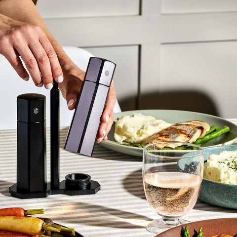 HexClad HexMill on dining table seasoning food to improve meal presentation