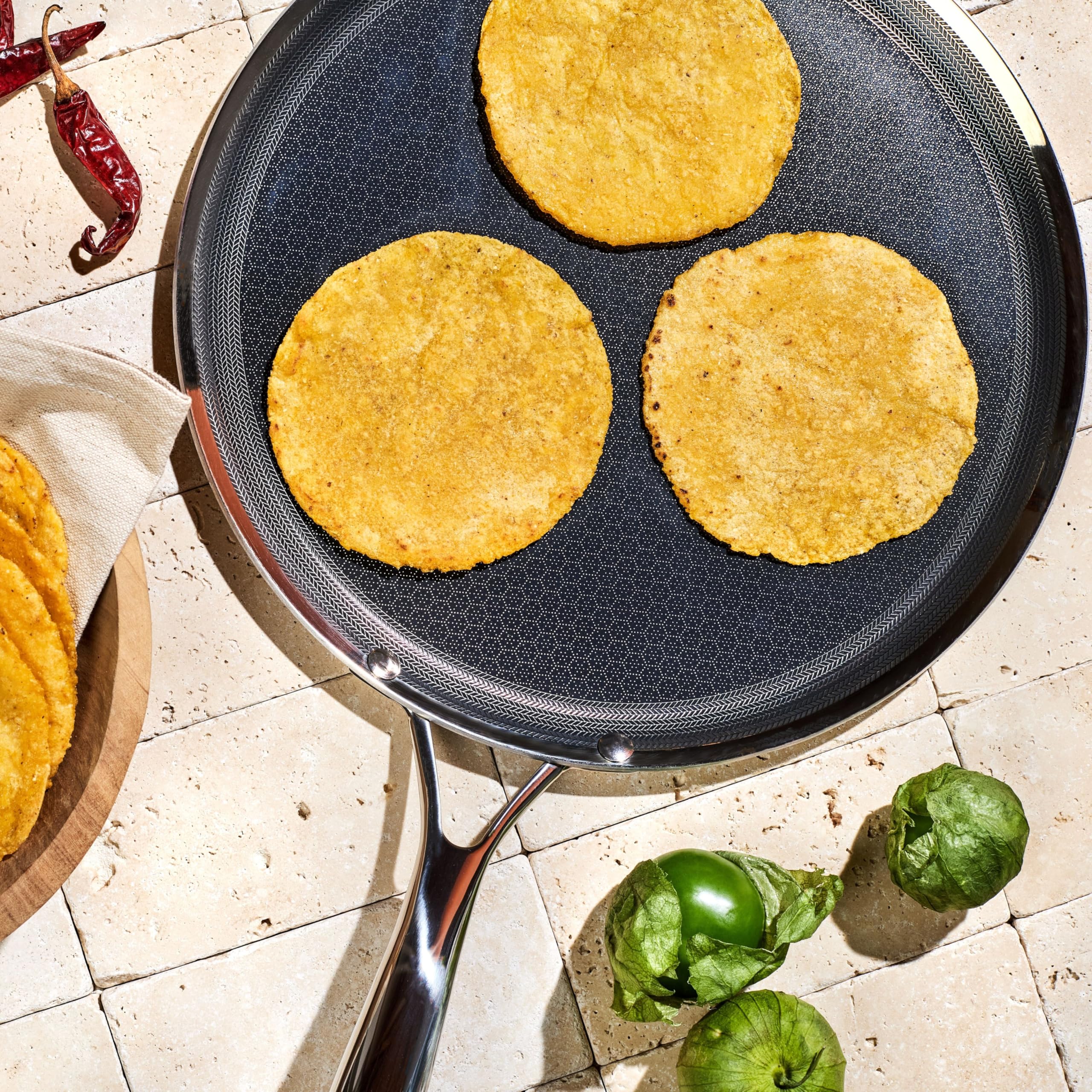 HexClad hybrid hexagonal surface closeup showing textured nonstick for better searing