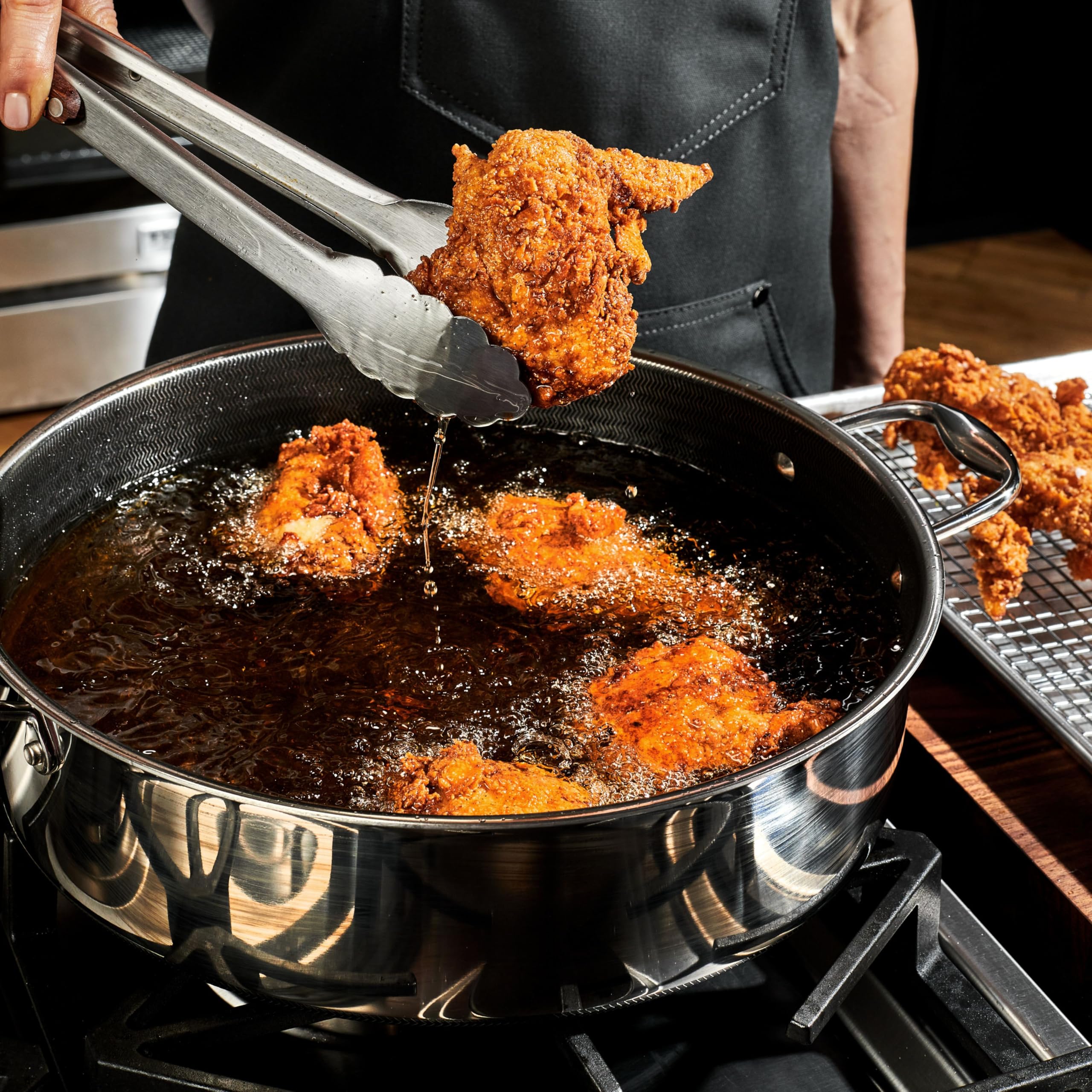 HexClad close-up of hexagonal hybrid cooking surface for improved searing