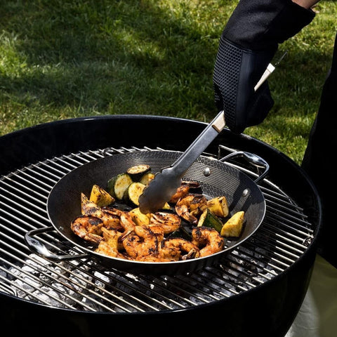 HexClad lifestyle shot in kitchen with plated food, indoor grilling benefit