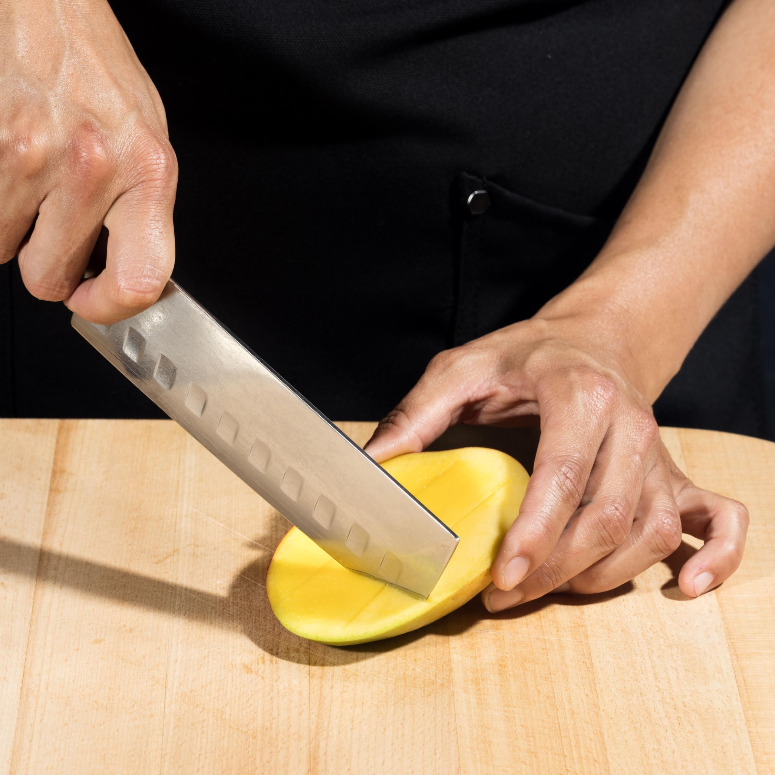 HexClad knife from above with packaging to show presentation and storage readiness