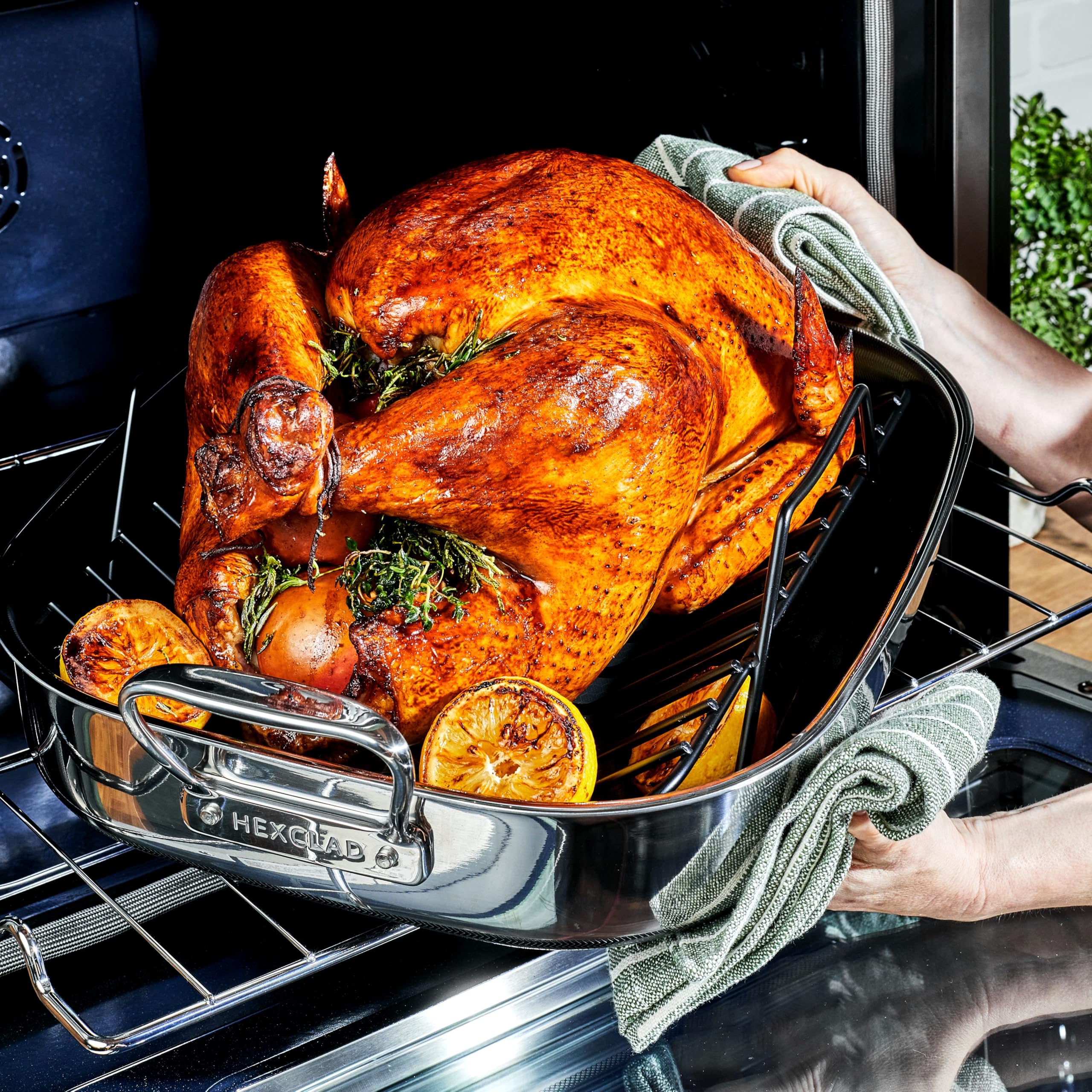 HexClad pan beside measuring tape showing dimensions and fit benefit for large meals