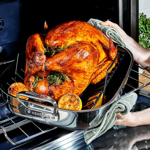 HexClad pan beside measuring tape showing dimensions and fit benefit for large meals