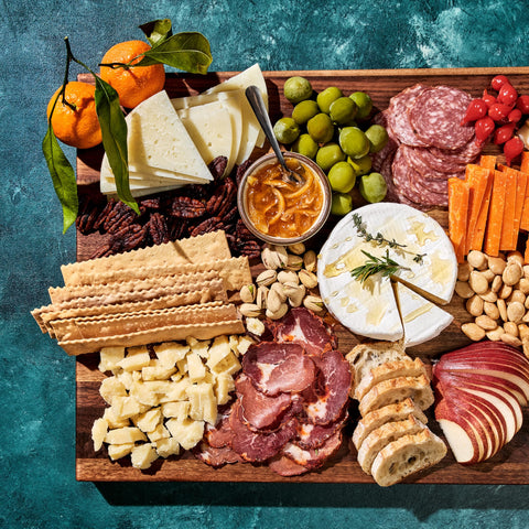 HexClad cutting board next to chef's knife to display scale and prep capacity benefit