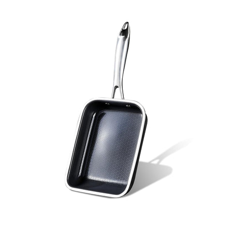HexClad pan on breakfast table with rolled omelette shows consistent results benefit