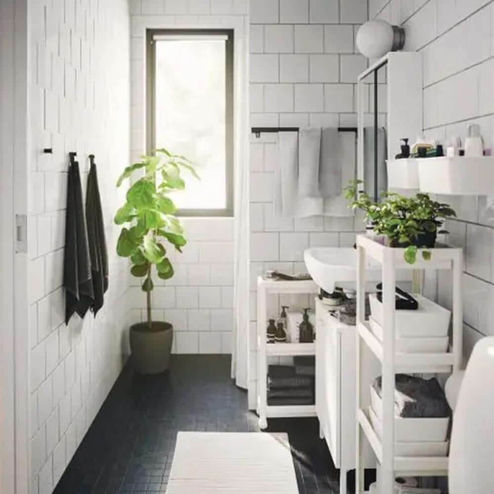 HIEEY in laundry room between washer showing convenient access