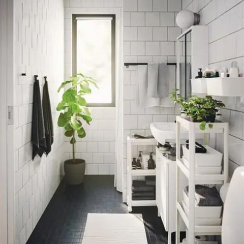HIEEY in laundry room between washer showing convenient access