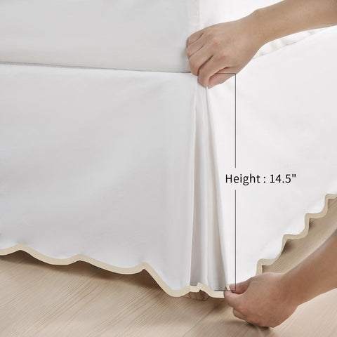 HIG installed on queen bed showing full 14-inch drop concealing storage