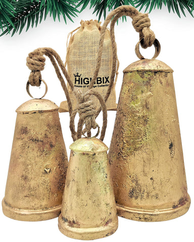 HIGHBIX front view of three giant handmade cone bells showing rustic brass finish and visual impact