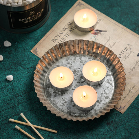 HILUMIDA tealights in decorative holders showing ambient lighting benefit