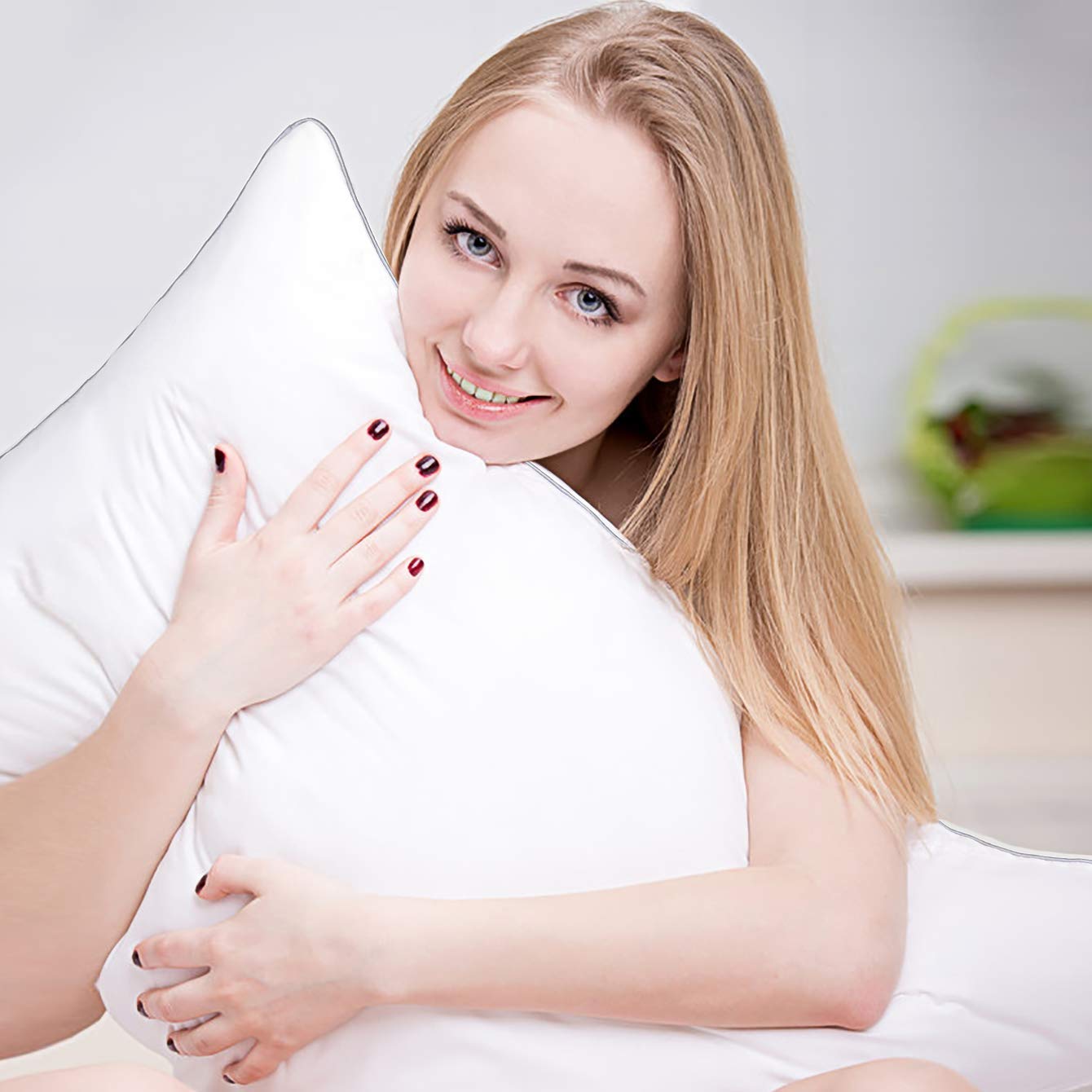 HIMOON pillow size comparison on bed showing king-scale fit advantage