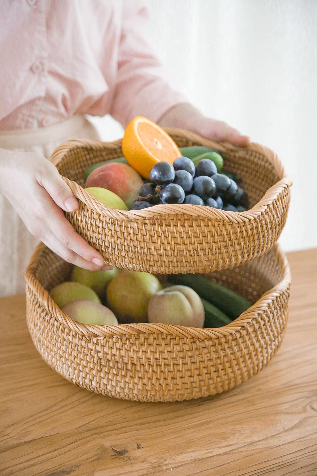 HITOMEN basket styled on kitchen counter with fruit, adding natural warmth and organization