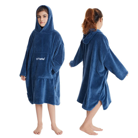 Hiturbo poncho laid next to ruler to show length and fit