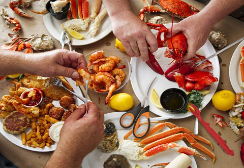 HIWARE seafood tools arranged on a table for a tidy, enjoyable family meal