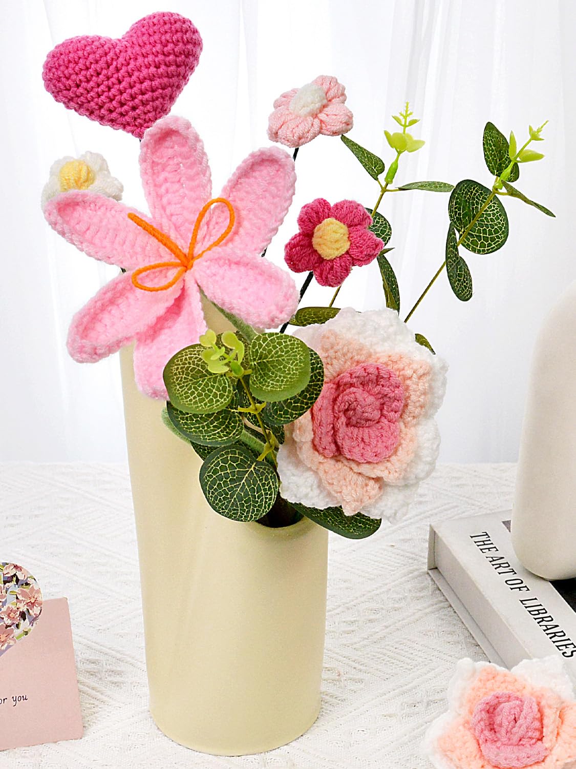 Hlenbin daisies with eucalyptus arranged to show natural silhouette and balance