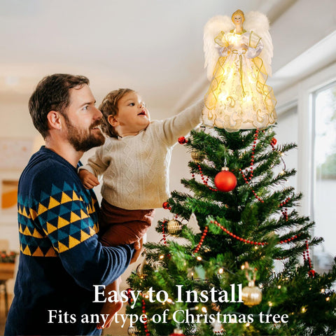HMASYO angel on tree at night creating warm festive ambiance