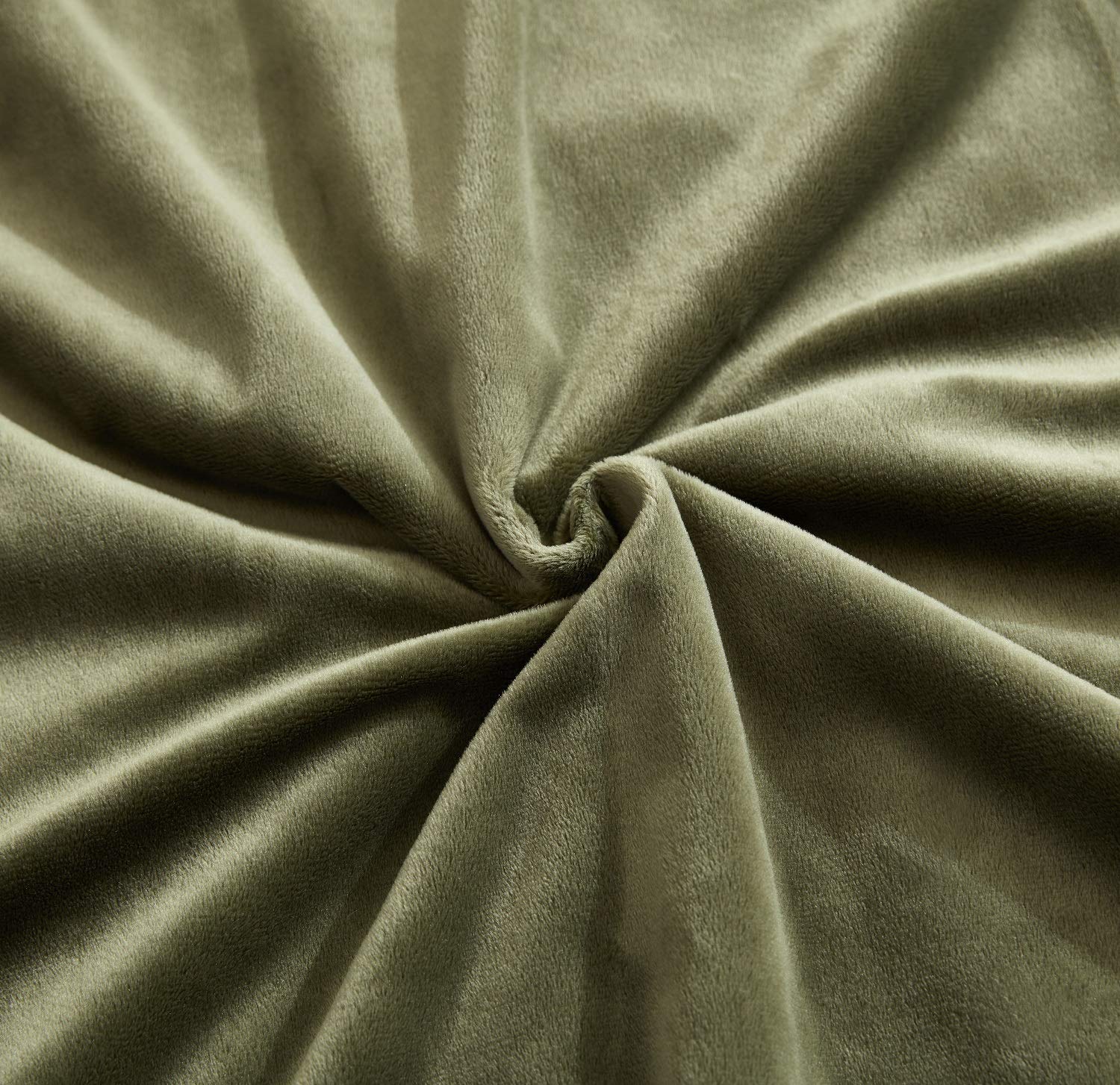 Hobed Life blanket layered on bed for decorative and cozy effect
