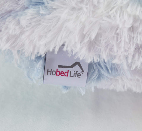 Hobed Life care label and stitching close-up illustrating durable construction and easy care