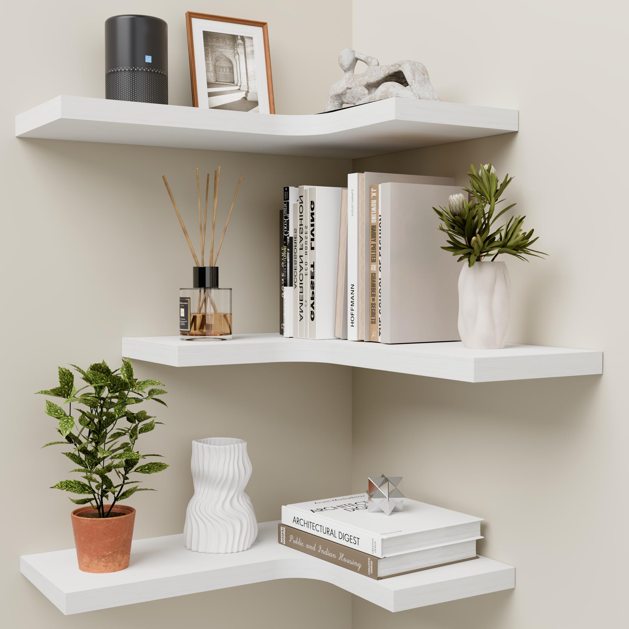 Homagle front view of three white L-shaped corner shelves showing clean lines and space-saving benefit