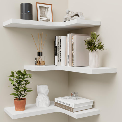 Homagle front view of three white L-shaped corner shelves showing clean lines and space-saving benefit