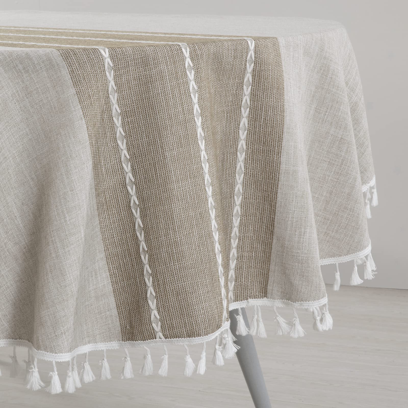 HOMBYS tablecloth on oval table in dining setting showing stylish protection
