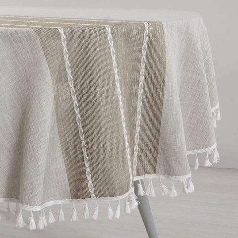 HOMBYS tablecloth on oval table in dining setting showing stylish protection