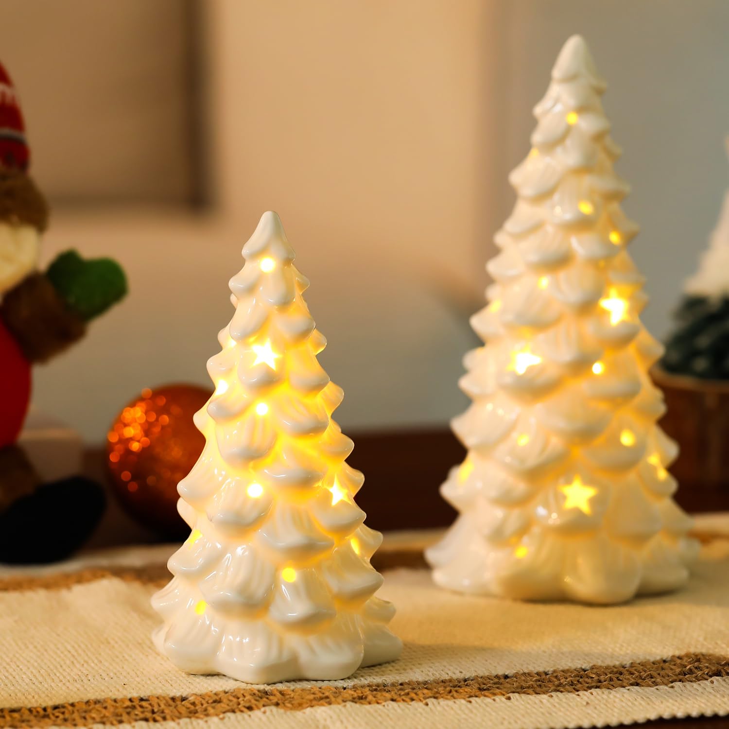 HOMCDALY front view of both white ceramic trees showing elegant silhouette and glow