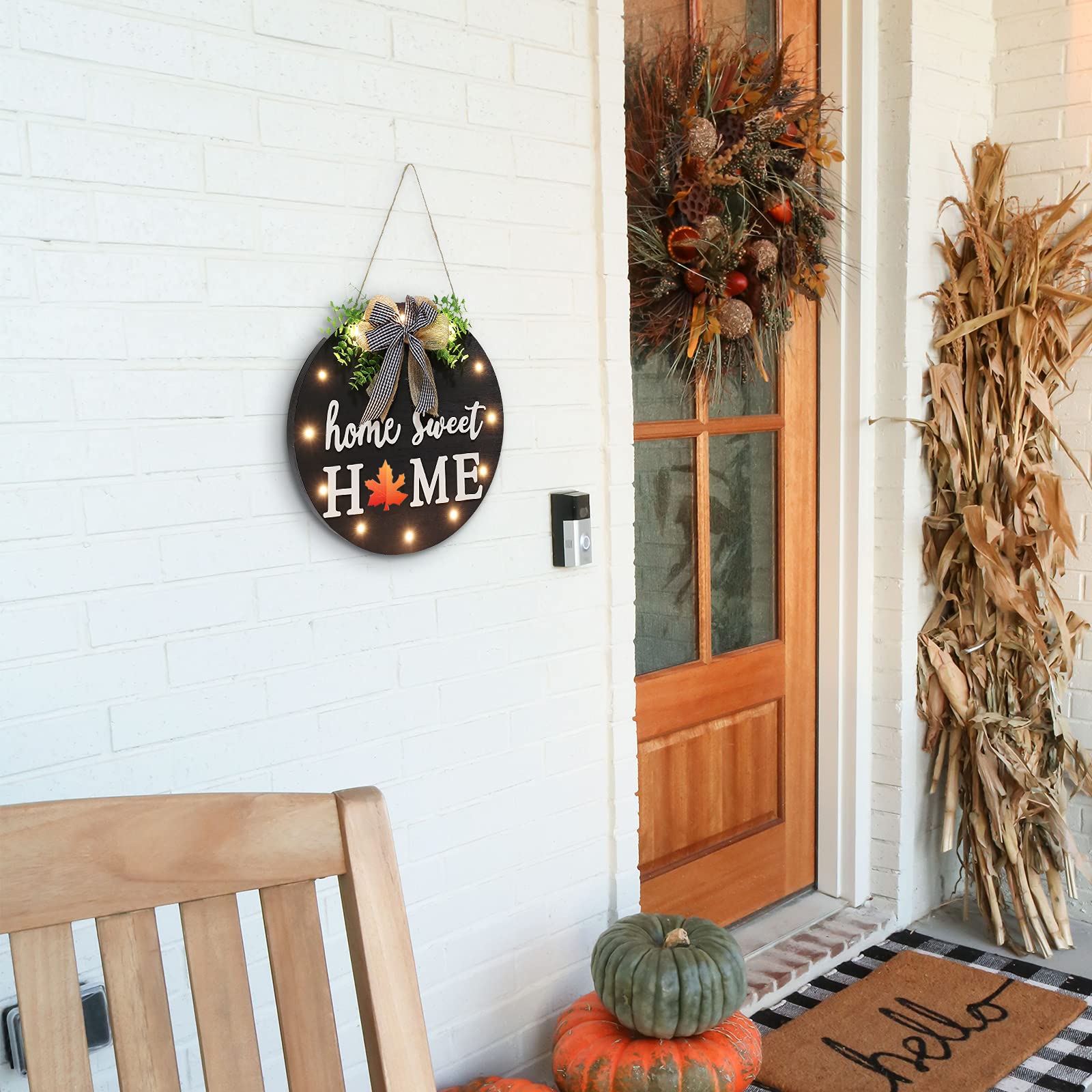 HOMCDALY illuminated LED ring at dusk creating warm porch ambiance for guests