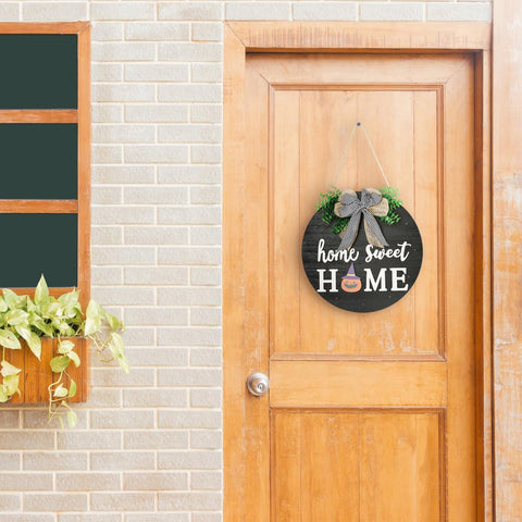 HOMCDALY sign next to door knob showing compact 12x12 size for easy placement