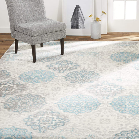 Home Dynamix front view of rug showing grey blue medallion and room-ready styling