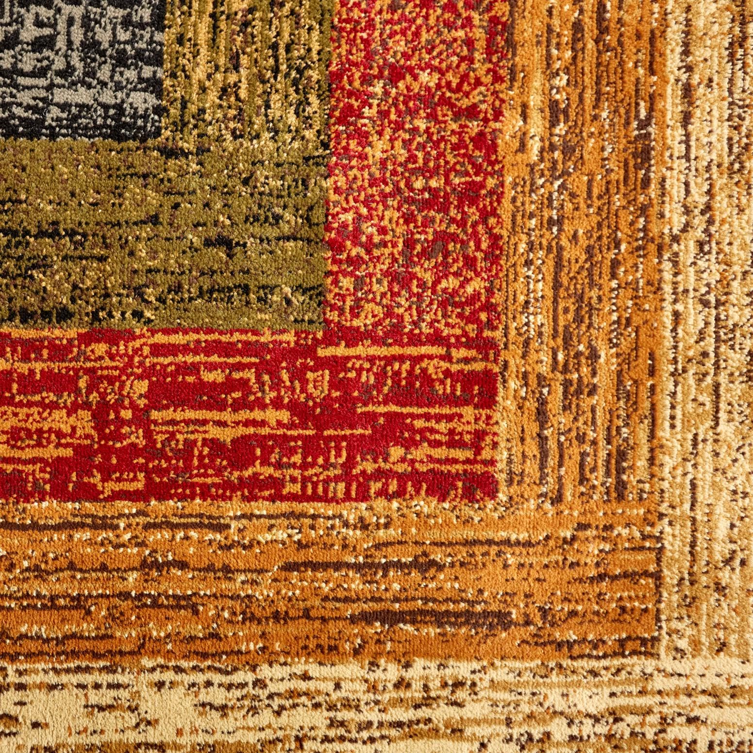 Home Dynamix in living room displays how rug defines seating area effectively