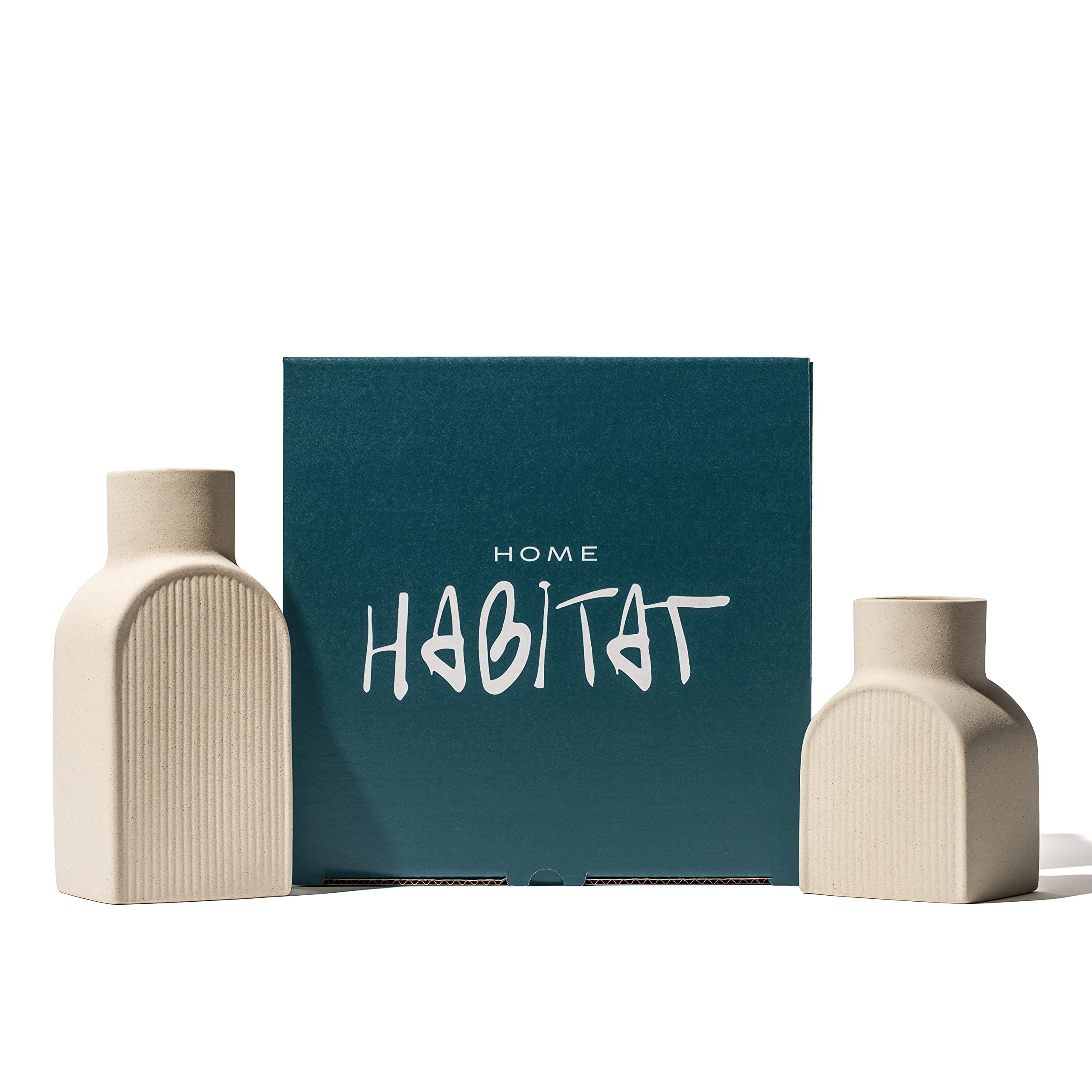 Home Habitat vases on dining table with objects for size comparison and styling ideas