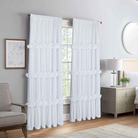 Homechoice Decor curtain panel beside chair showing scale and full 84-inch length