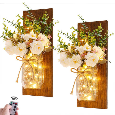 Homecor front view showing two hanging mason jar sconces and warm glow