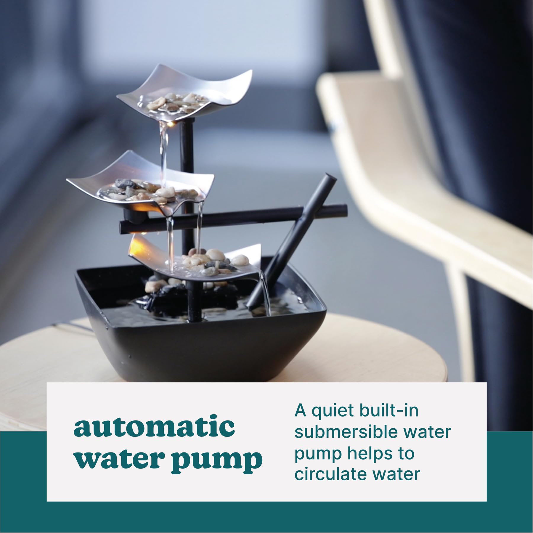 Homedics fountain on office desk reducing stress with soft water sound