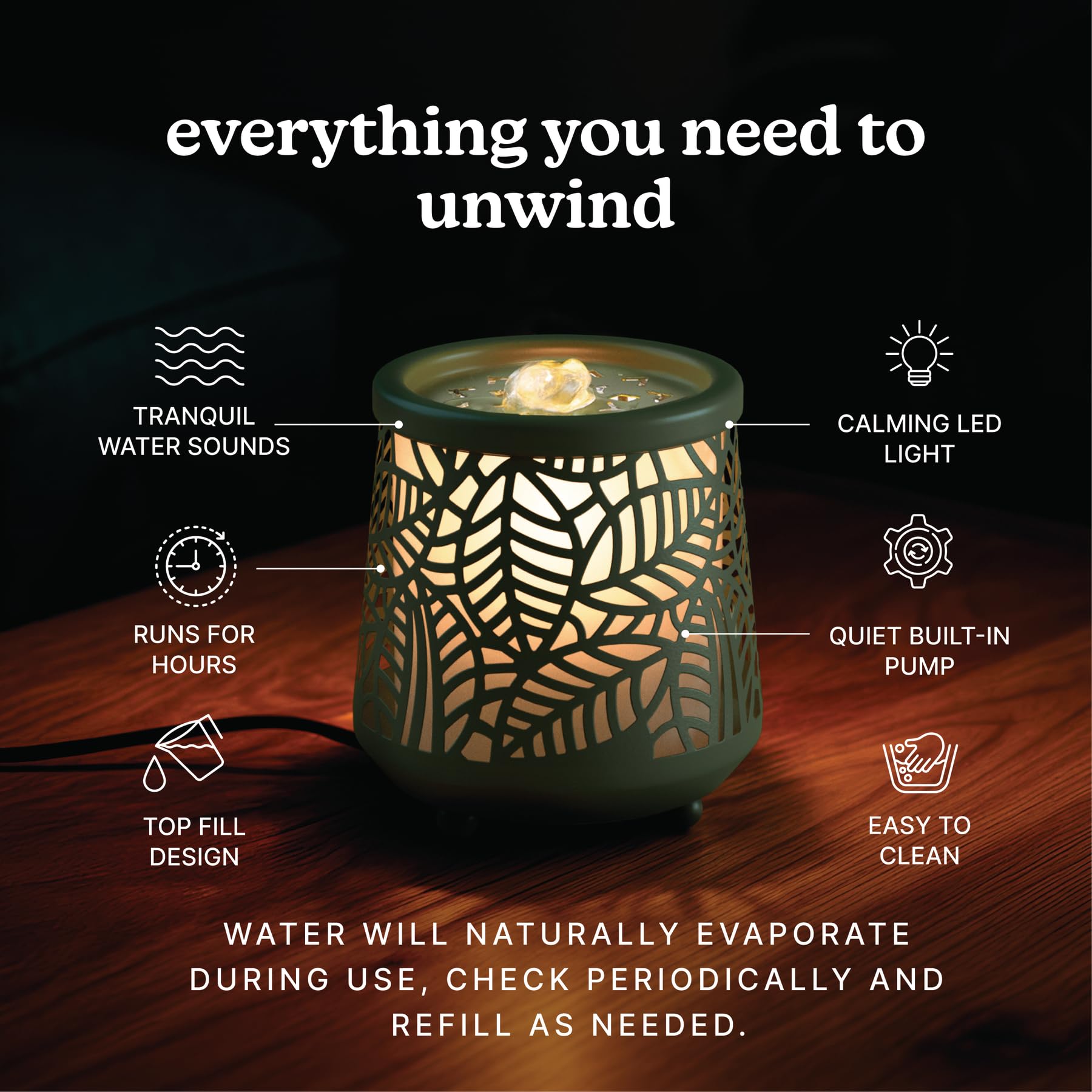Homedics fountain illuminated by soft light creating warm ambience