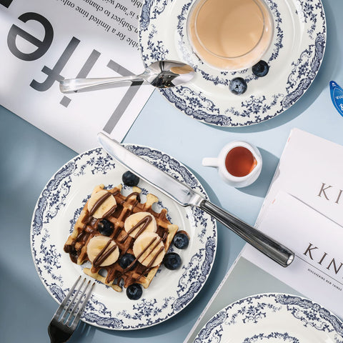 HomeElves styled dinner table showing plates in a complete place setting for entertaining