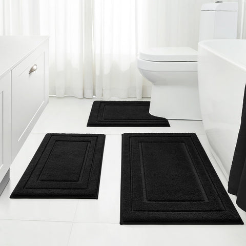 HOMEIDEAS front view of three black bath mats showing coordinated set and comfort