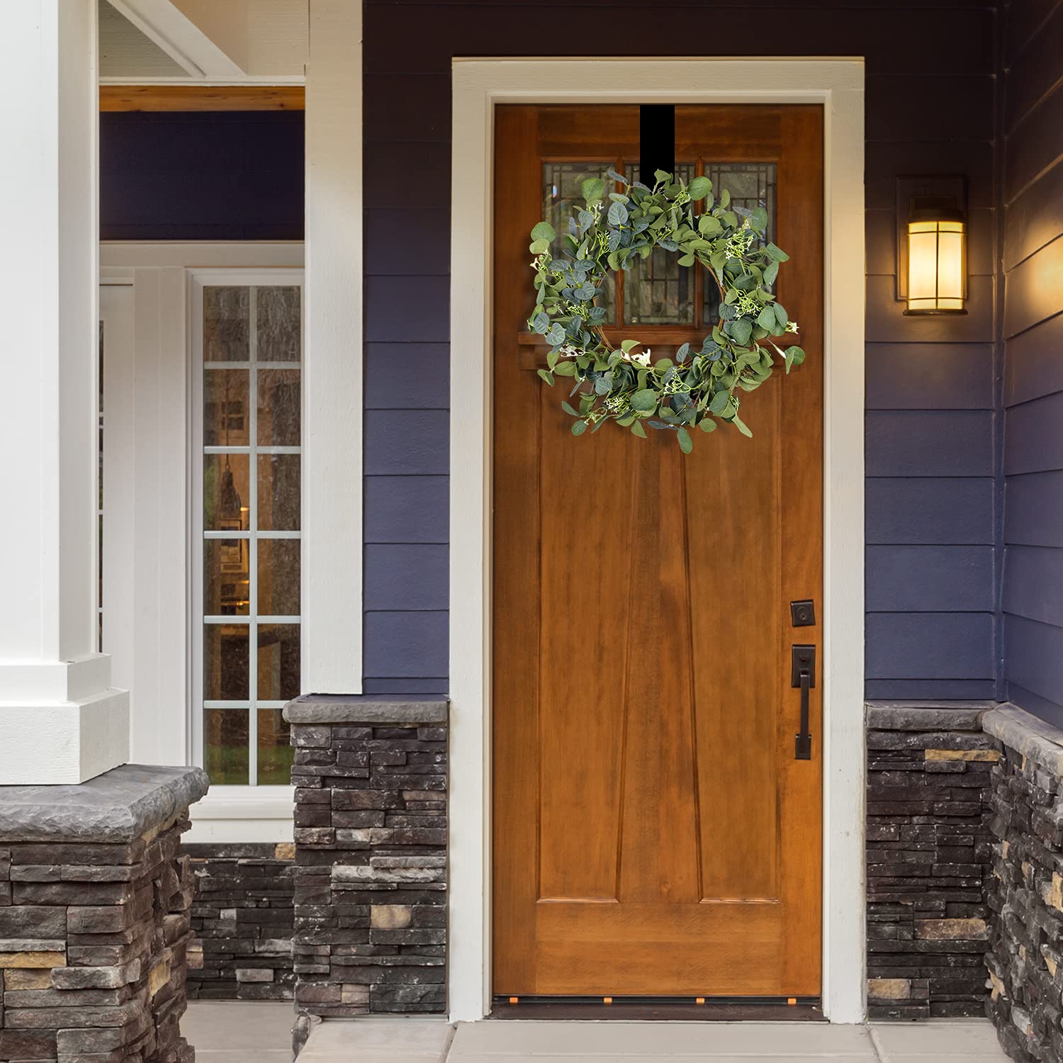 HomeKaren wreath displayed above mantel adding instant room freshness benefit