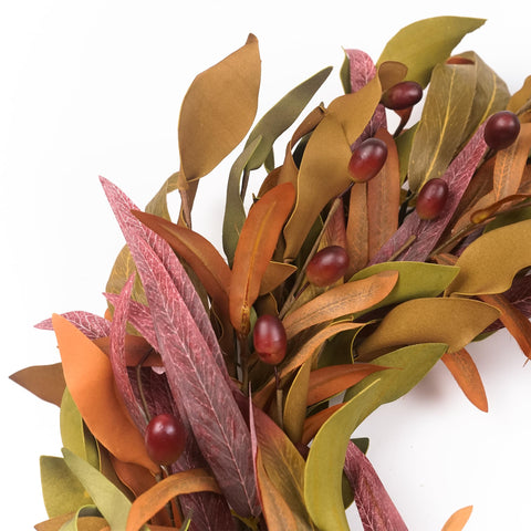 HomeKaren side profile of wreath displaying thickness and shaped silhouette for fullness