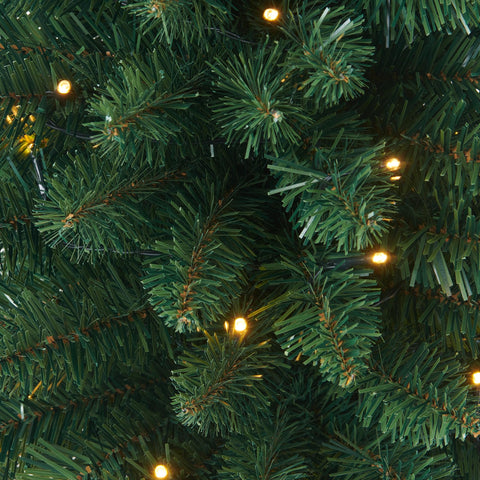 HomeKaren tree styled on mantel displaying festive ambiance for small spaces