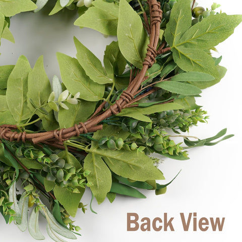 HomeKaren wreath above a mantel providing year-round decorative greenery