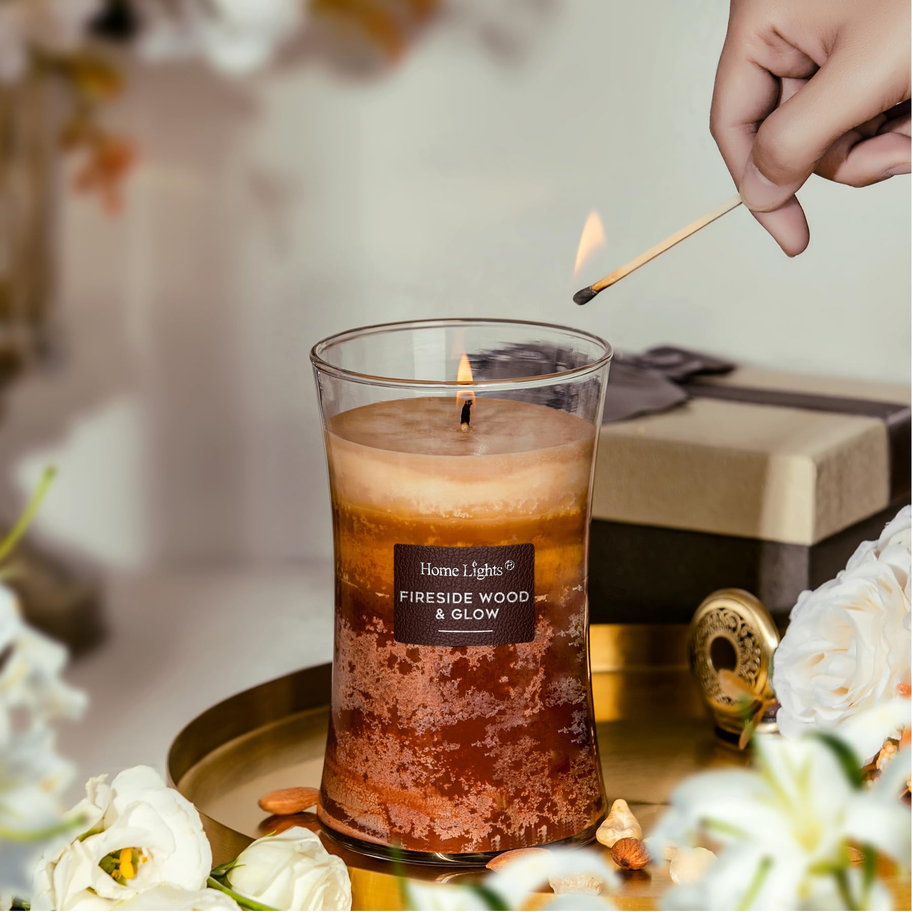 HomeLights candle burning on mantel creating warm ambiance and glow