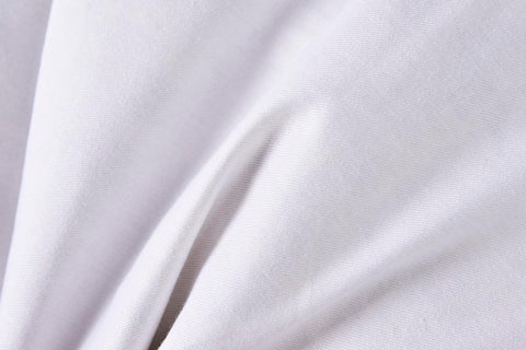 HOMESJUN insert inside a decorative throw pillow on sofa showing fuller look benefit