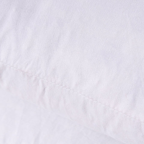 HOMESJUN pillow insert inside decorative cover on sofa showing enhanced fullness