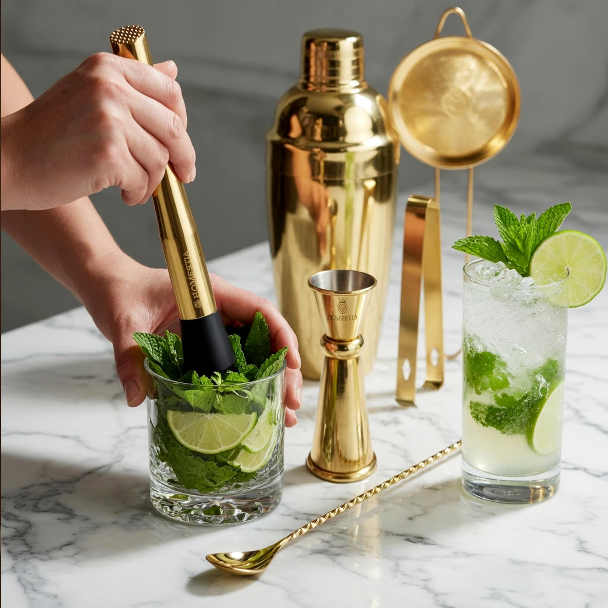 Homestia gold fine mesh strainer close-up for smooth, chip-free cocktail texture