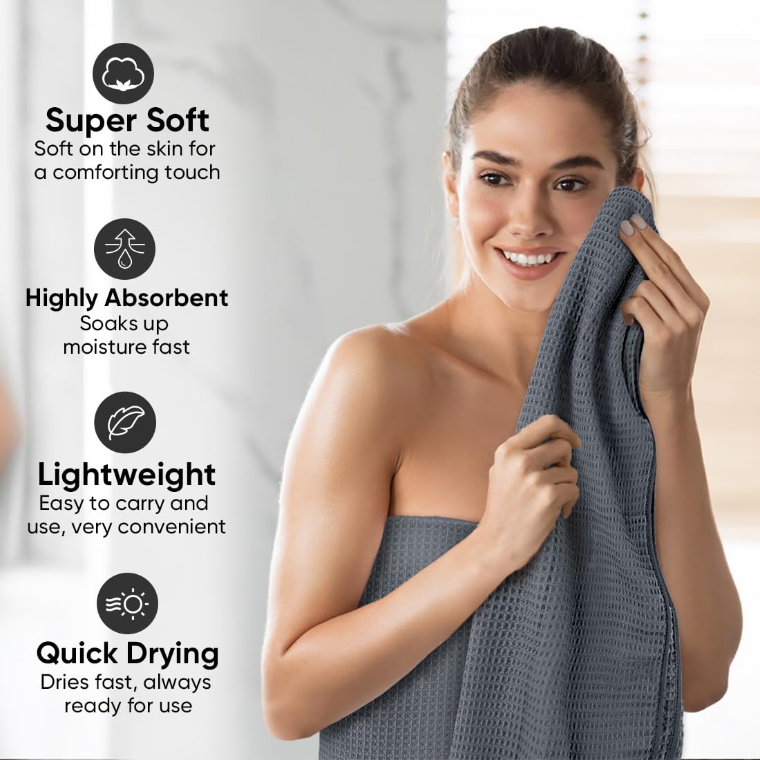 HOMEXCEL folded towel stack in bathroom showing compact storage and lightweight convenience