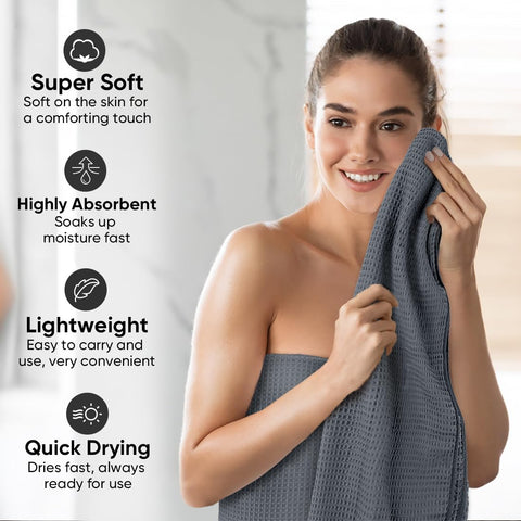 HOMEXCEL folded towel stack in bathroom showing compact storage and lightweight convenience