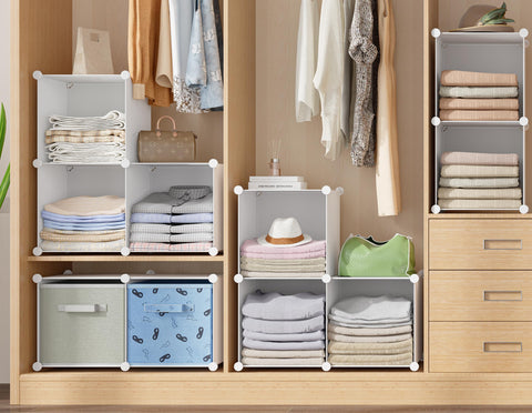 HOMIDEC organizer in bedroom showing neat folded clothes storage