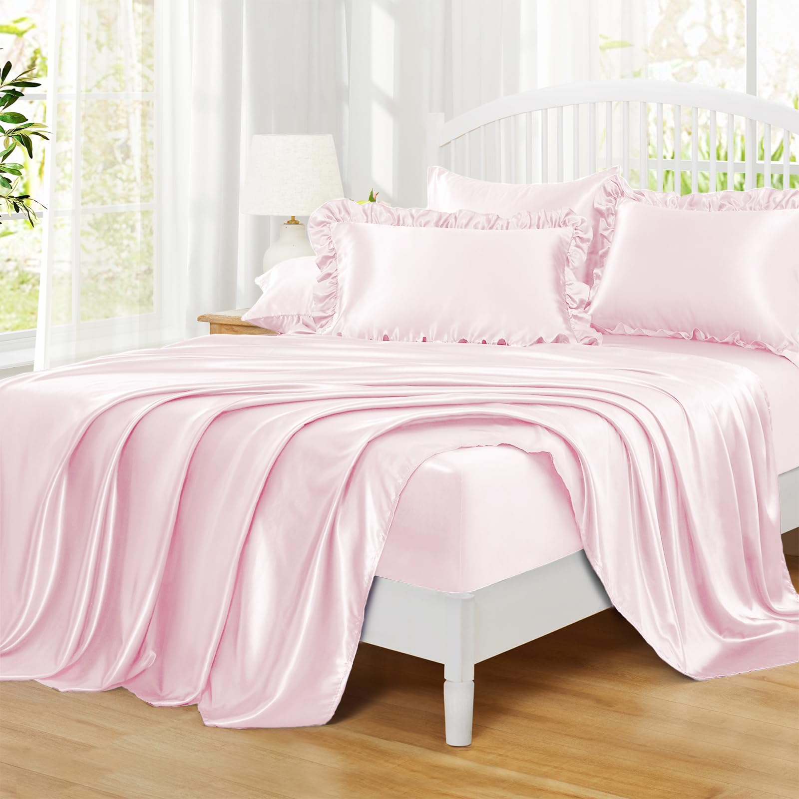 Homiest bedroom lifestyle styled bed showcasing set’s blush pink finish and elevated decor